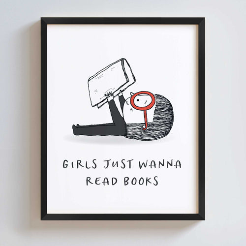 Framed artwork with a black and white illustration of a girl holding a book and text 'Girls just wanna read books' on a white background.