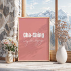 Framed poster with 'Cha-Ching is my love language' text on a pink background, placed on a windowsill with decorative elements.