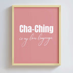 Framed pink poster with 'Cha-Ching is my love language' text on a white background